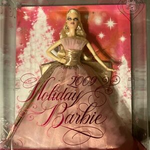 Holiday Barbie 2009 edition - 50th anniv.. H 13 1/2 in. W 11 in. Base 3 3/4 in